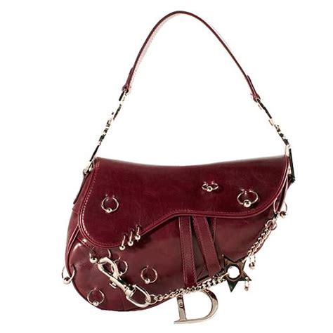 dior pierced saddle bag